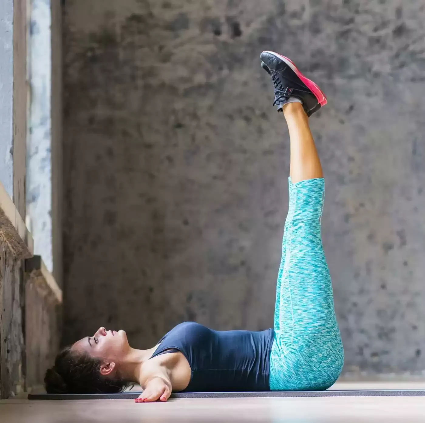 fit-young-woman-doing-stretching-exercise-yoga-mat-1.jpg.webp